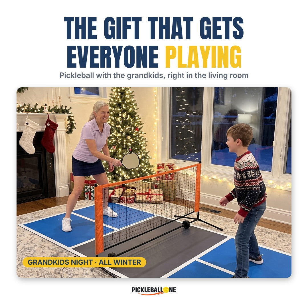 Grandmother and grandson playing pickleball on the Duo Court next to a Christmas tree